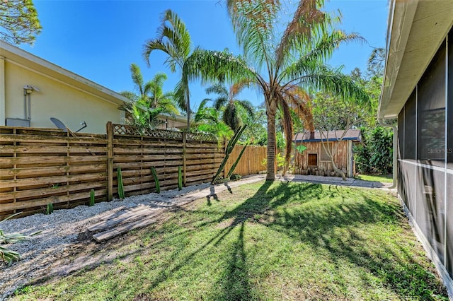 view of yard with a storage shed