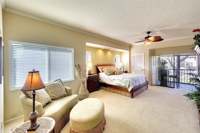 bedroom with access to exterior, ceiling fan, light carpet, and multiple windows