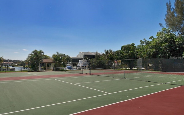 view of tennis court with basketball court