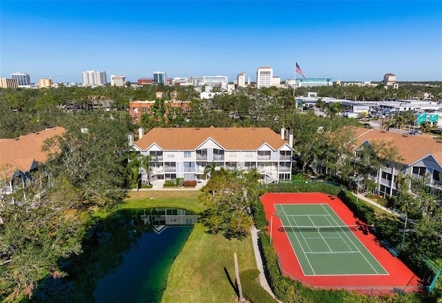 birds eye view of property featuring a water view