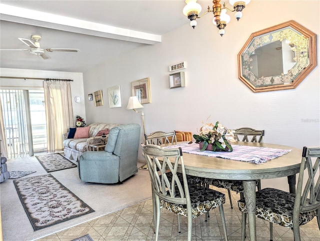 2228 Canal Dr Unit D26, Bradenton, FL 34207 - dining space with a chandelier, beam ceiling, and a ceiling fan