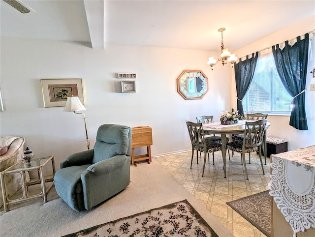 2228 Canal Dr Unit D26, Bradenton, FL 34207 - dining room with a chandelier and beam ceiling
