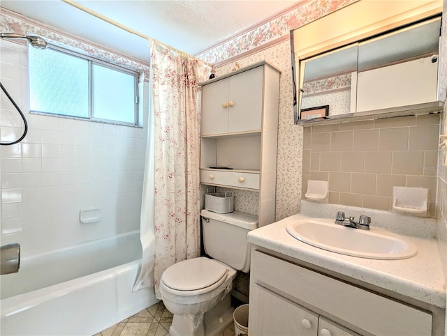 full bathroom with vanity, shower / bath combination with curtain, a textured ceiling, and toilet