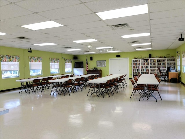 2228 Canal Dr Unit D26, Bradenton, FL 34207 - dining space featuring a drop ceiling and healthy amount of natural light