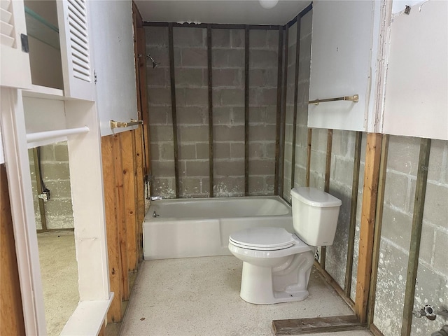 bathroom with toilet and bathing tub / shower combination