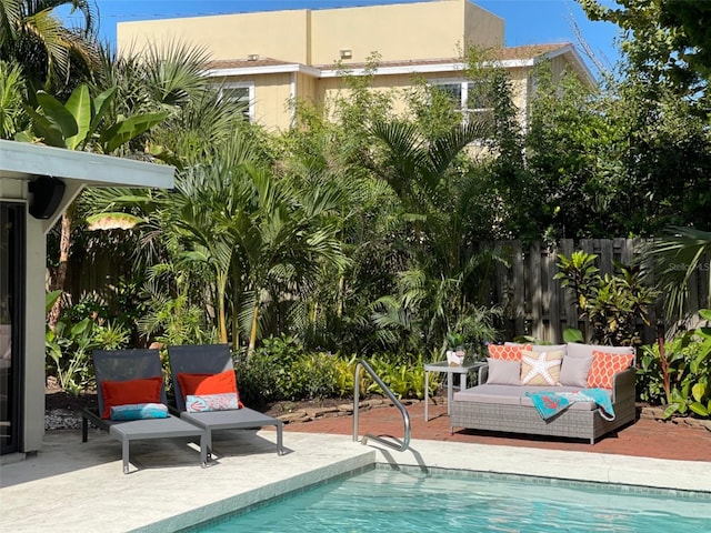 view of swimming pool featuring an outdoor hangout area and a patio area