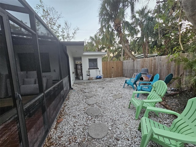 view of yard with a lanai