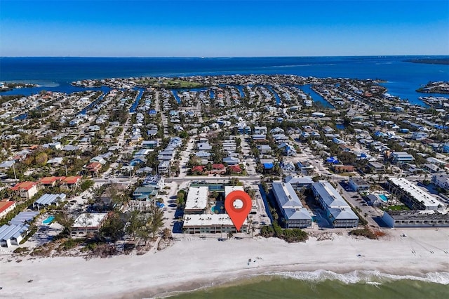 aerial view featuring a view of the beach and a water view