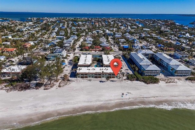 birds eye view of property featuring a water view and a view of the beach