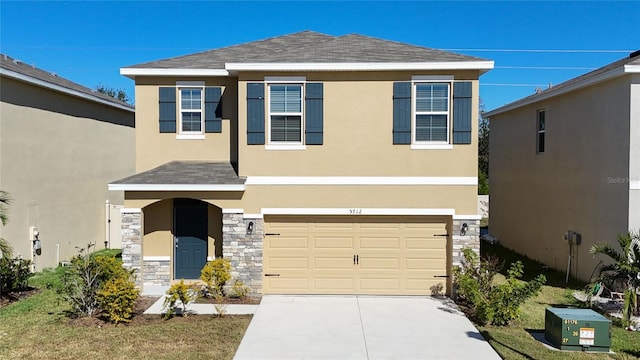 front of property with a garage