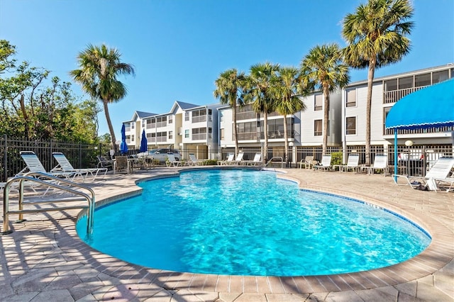 view of swimming pool with a patio