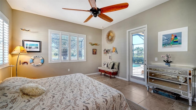 bedroom featuring access to outside, tile patterned floors, and ceiling fan