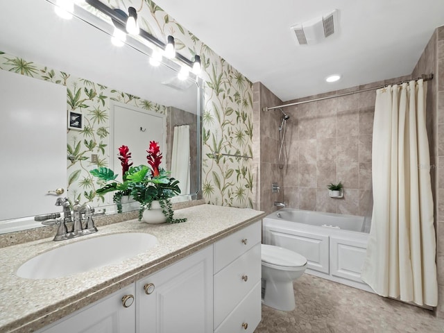 full bathroom with vanity, toilet, and shower / tub combo with curtain