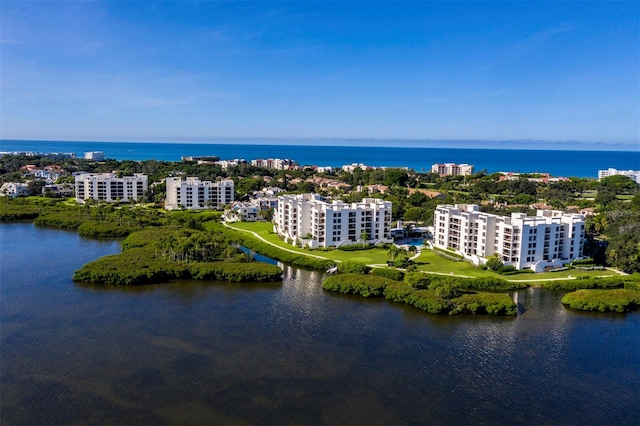 drone / aerial view with a water view