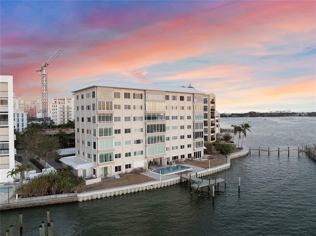 outdoor building at dusk with a water view