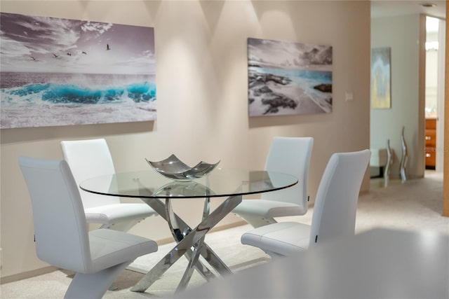 view of carpeted dining room