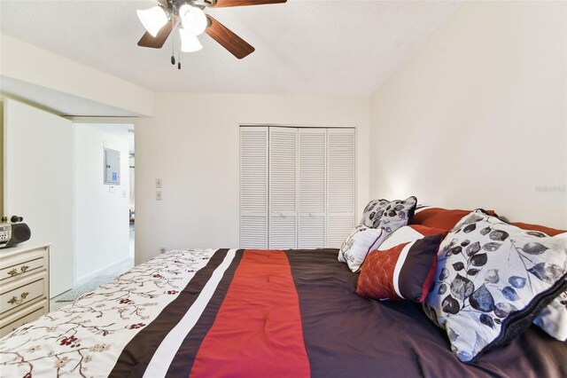 bedroom with a closet and ceiling fan