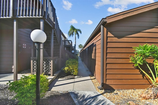 view of home's exterior with a balcony