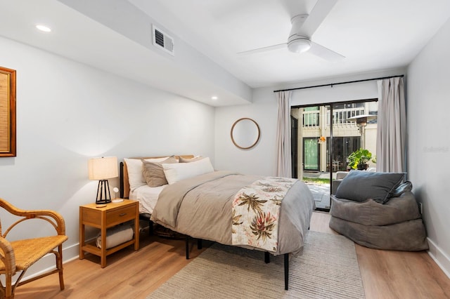 bedroom featuring access to outside, ceiling fan, and light hardwood / wood-style floors