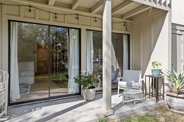 property entrance with a patio