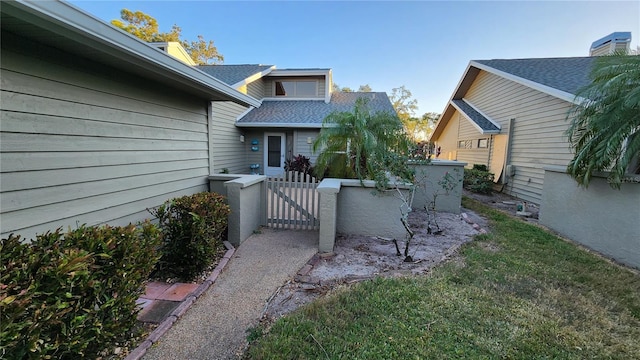 3409 Avenida Madera Unit A, Bradenton, FL 34210 - view of yard featuring a gate