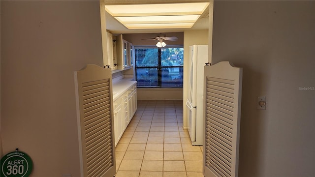 hallway featuring light tile patterned floors