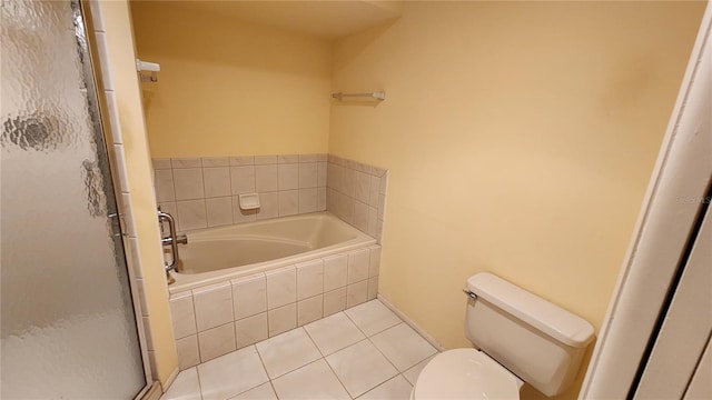 bathroom with tile patterned floors, toilet, and plus walk in shower