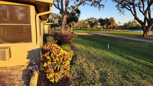 3409 Avenida Madera Unit A, Bradenton, FL 34210 - view of grassy yard featuring a water view