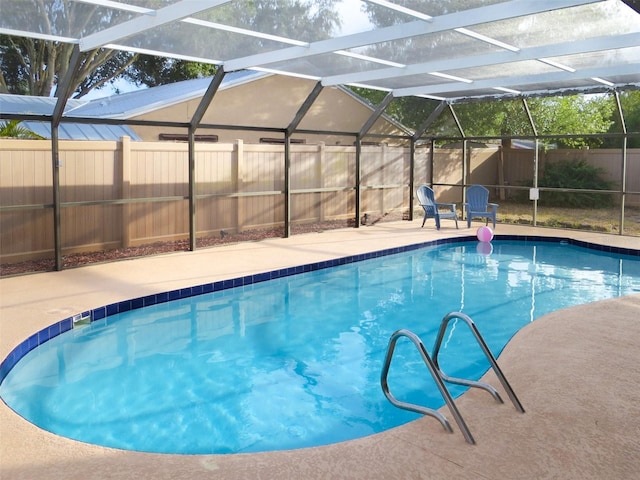 3405 Highland Ave W, Bradenton, FL 34205 - view of swimming pool featuring a fenced backyard, a lanai, and a patio area