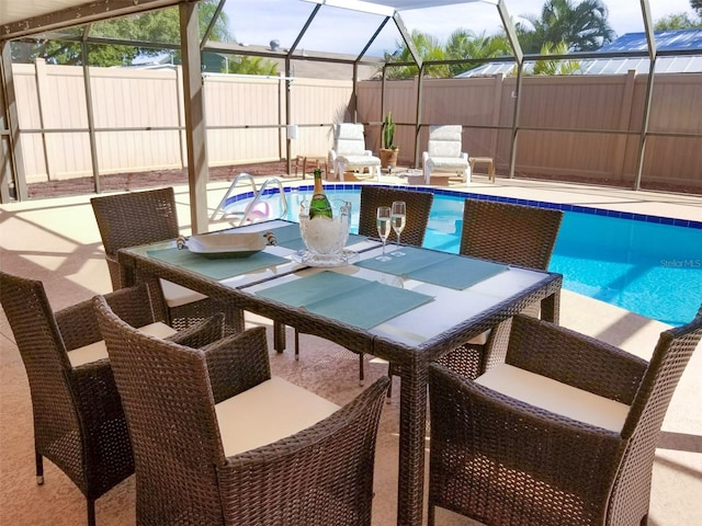 view of pool featuring a lanai and a patio