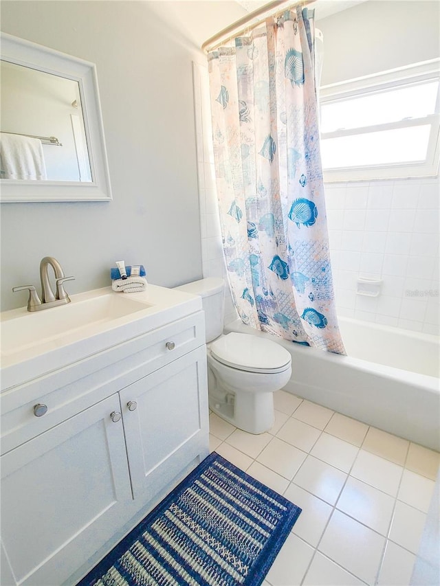 3405 Highland Ave W, Bradenton, FL 34205 - bathroom with shower / bath combo, vanity, toilet, and tile patterned floors