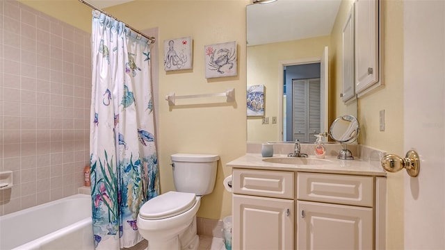 full bathroom with shower / bath combination with curtain, vanity, and toilet