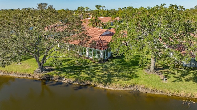 birds eye view of property featuring a water view