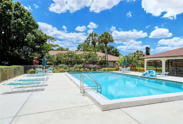 view of pool with a patio area