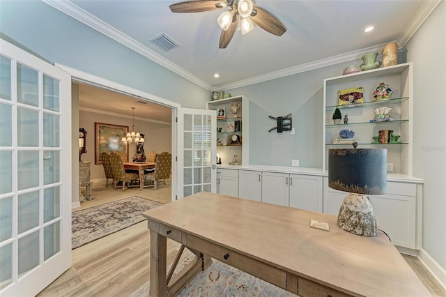 office area featuring french doors, crown molding, light hardwood / wood-style flooring, and ceiling fan with notable chandelier