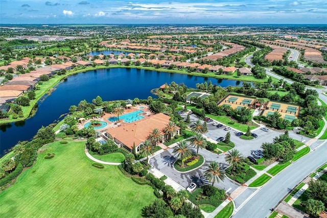 birds eye view of property featuring a water view