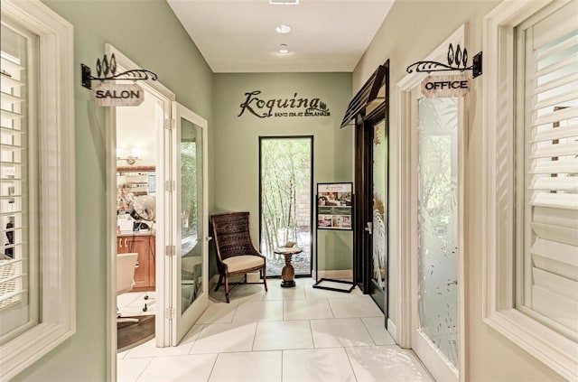 doorway featuring light tile patterned floors