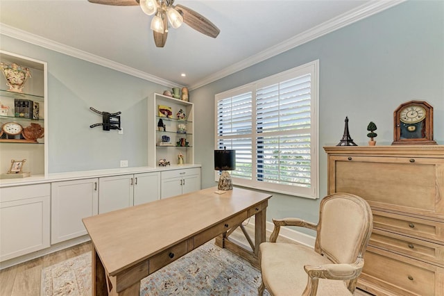 home office with ceiling fan, sink, light hardwood / wood-style floors, and ornamental molding