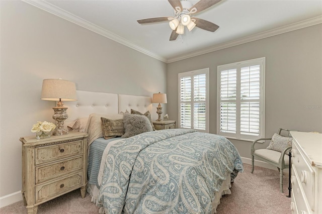 bedroom featuring ceiling fan, crown molding, and light colored carpet