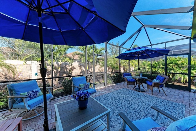 view of patio / terrace with glass enclosure