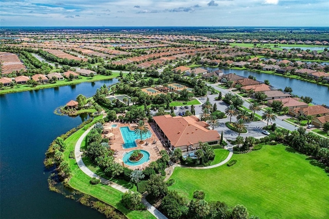 drone / aerial view with a water view