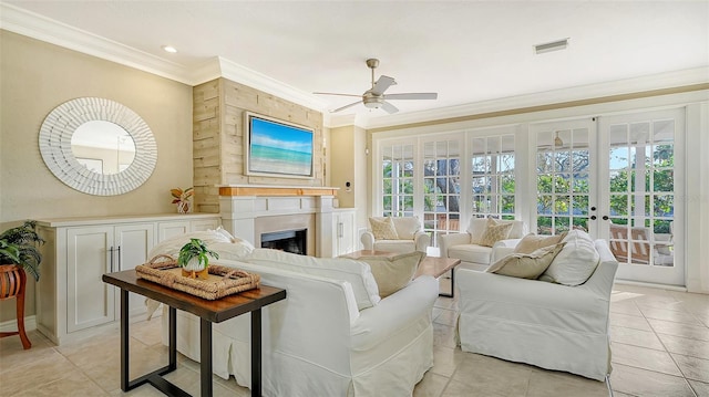 tiled living room featuring french doors, ceiling fan, and crown molding