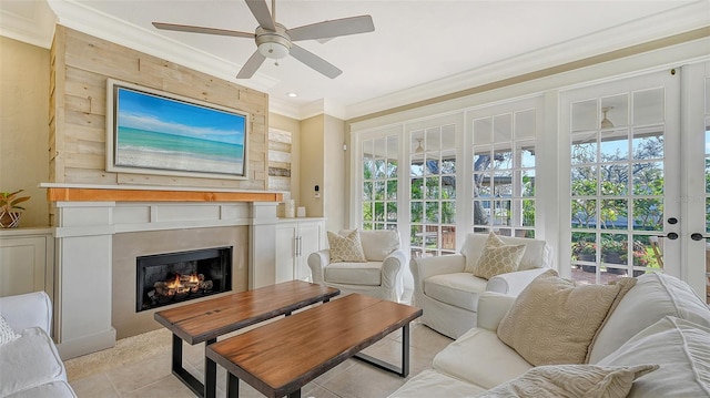 sunroom featuring ceiling fan