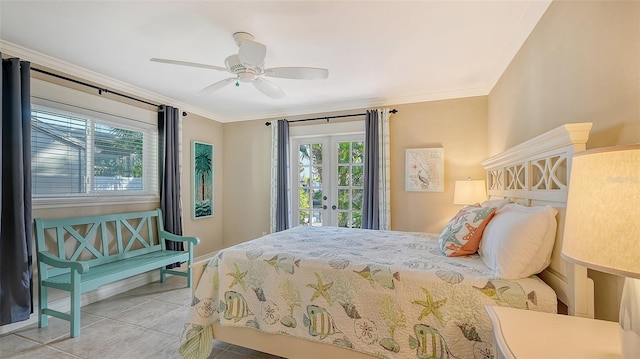 tiled bedroom featuring ceiling fan, crown molding, and french doors