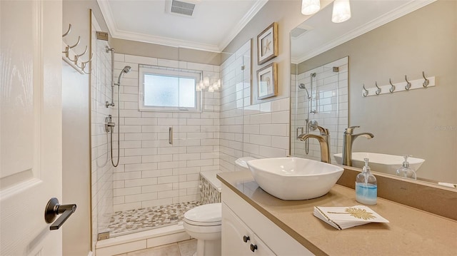 bathroom with tile patterned flooring, an enclosed shower, toilet, vanity, and ornamental molding