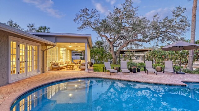 view of swimming pool featuring an outdoor hangout area and a patio