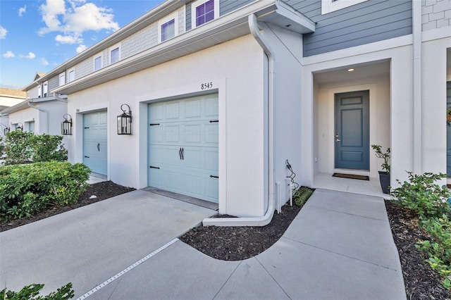 property entrance with a garage