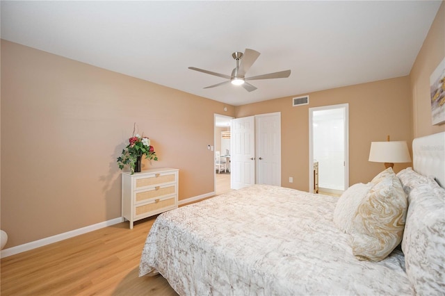 bedroom featuring ceiling fan and wood-type flooring