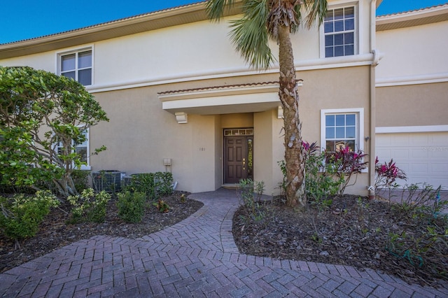 property entrance with a garage