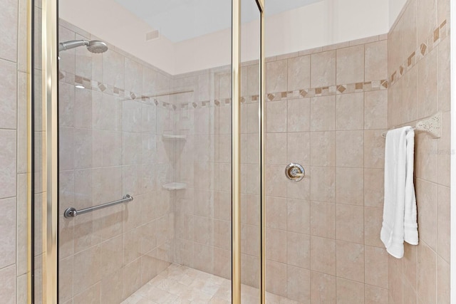 bathroom featuring an enclosed shower